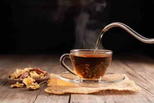 depositphotos_679570052-stock-photo-make-cup-hot-tea-glass